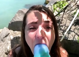 Sex crazed teen fucks herself with her favorite toy outdoors