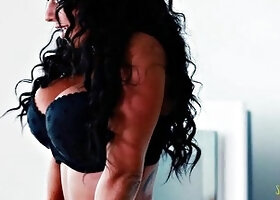Kerry Louise as Sultry Stock-Clad Vixen Bolsters Earthly Desire with Her Inked Allure